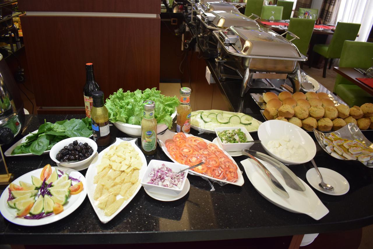 אבוג'ה Grand Pela Hotel & Suites מראה חיצוני תמונה